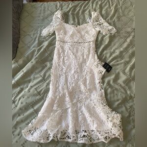 New white dress bought for bachelorette but had too many other dresses